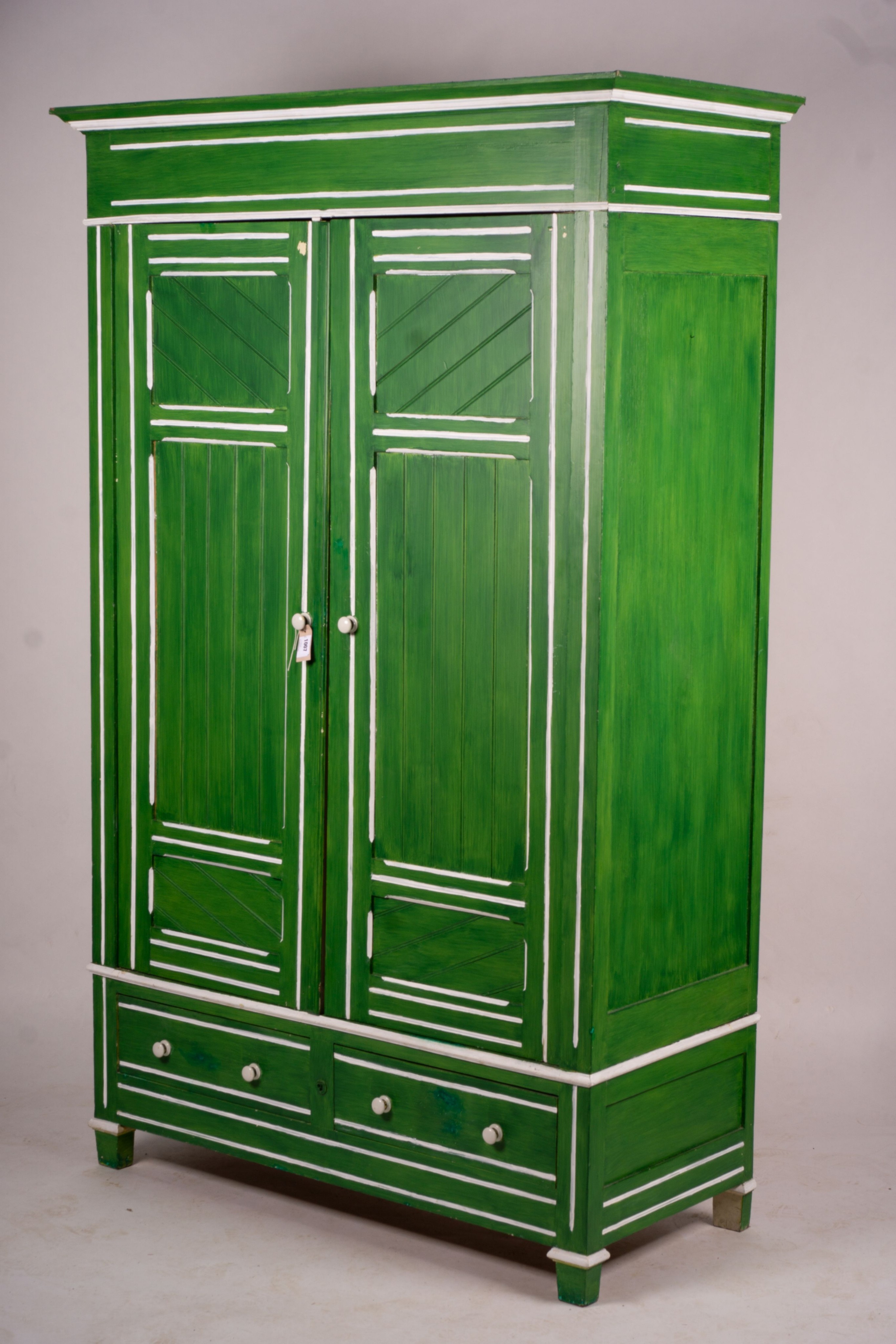 A late Victorian painted pine two door wardrobe, W.120cm H.212cm